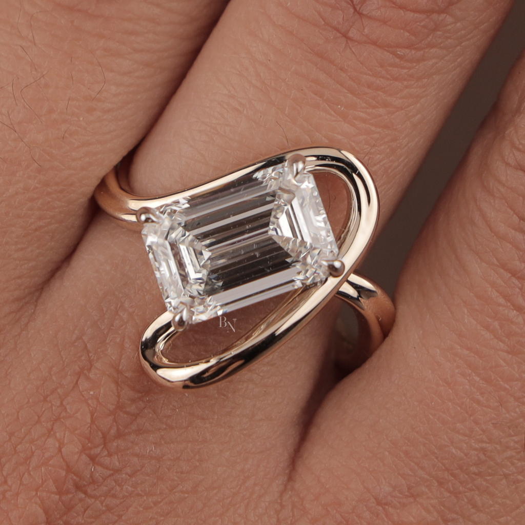 4ct Emerald Cut Lab Grown Diamond Engagement Ring | 14K Rose Gold East West Tension Setting | Swirl Bypass Solitaire | IGI Certified Jewelry (Copy)