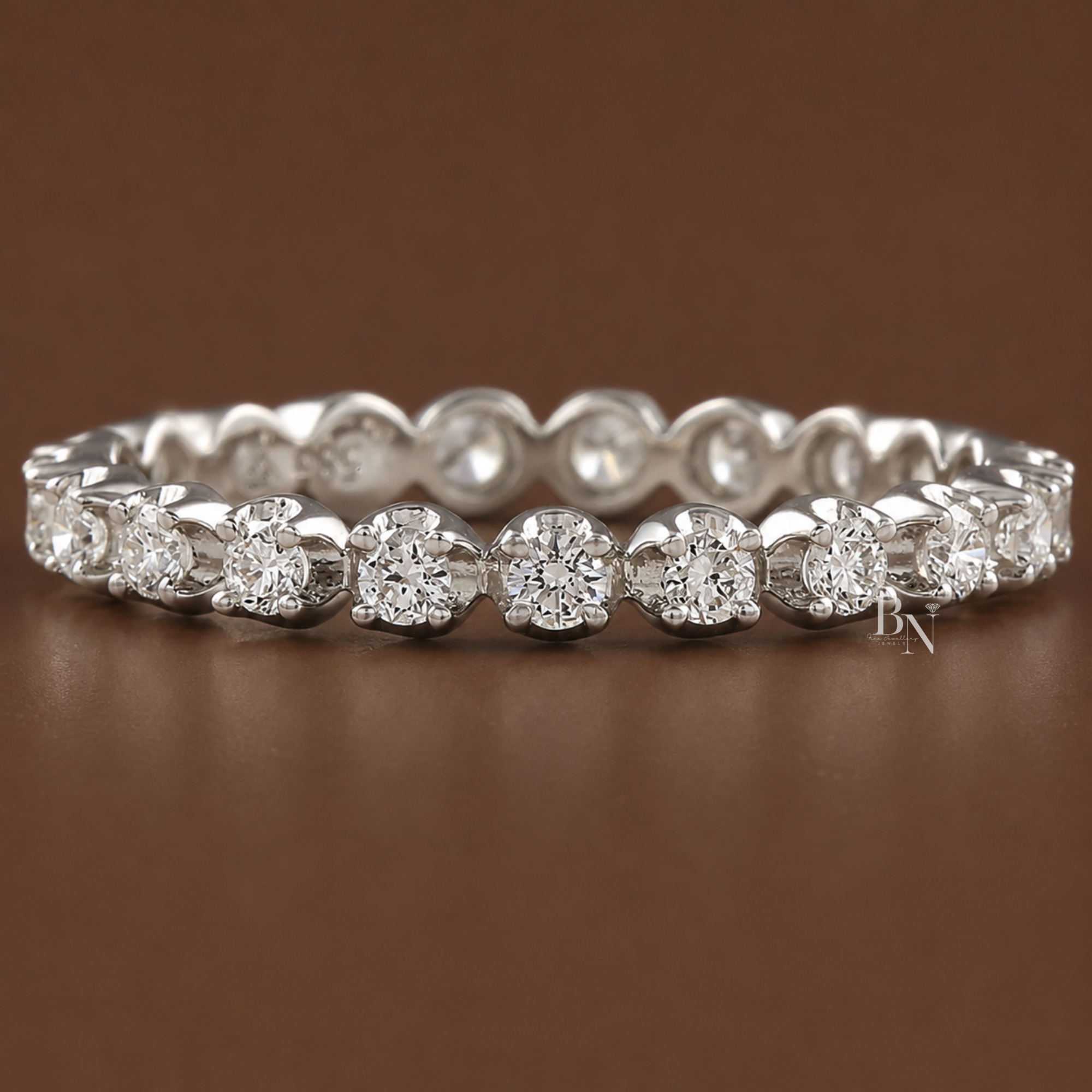 0.50 carat total weight round brilliant cut lab diamond full eternity band. Handcrafted in 14K white gold featuring a 2.5mm illusion style four-prong setting with small gaps. Perfect fine jewelry bridal stacking ring or elegant anniversary gift.