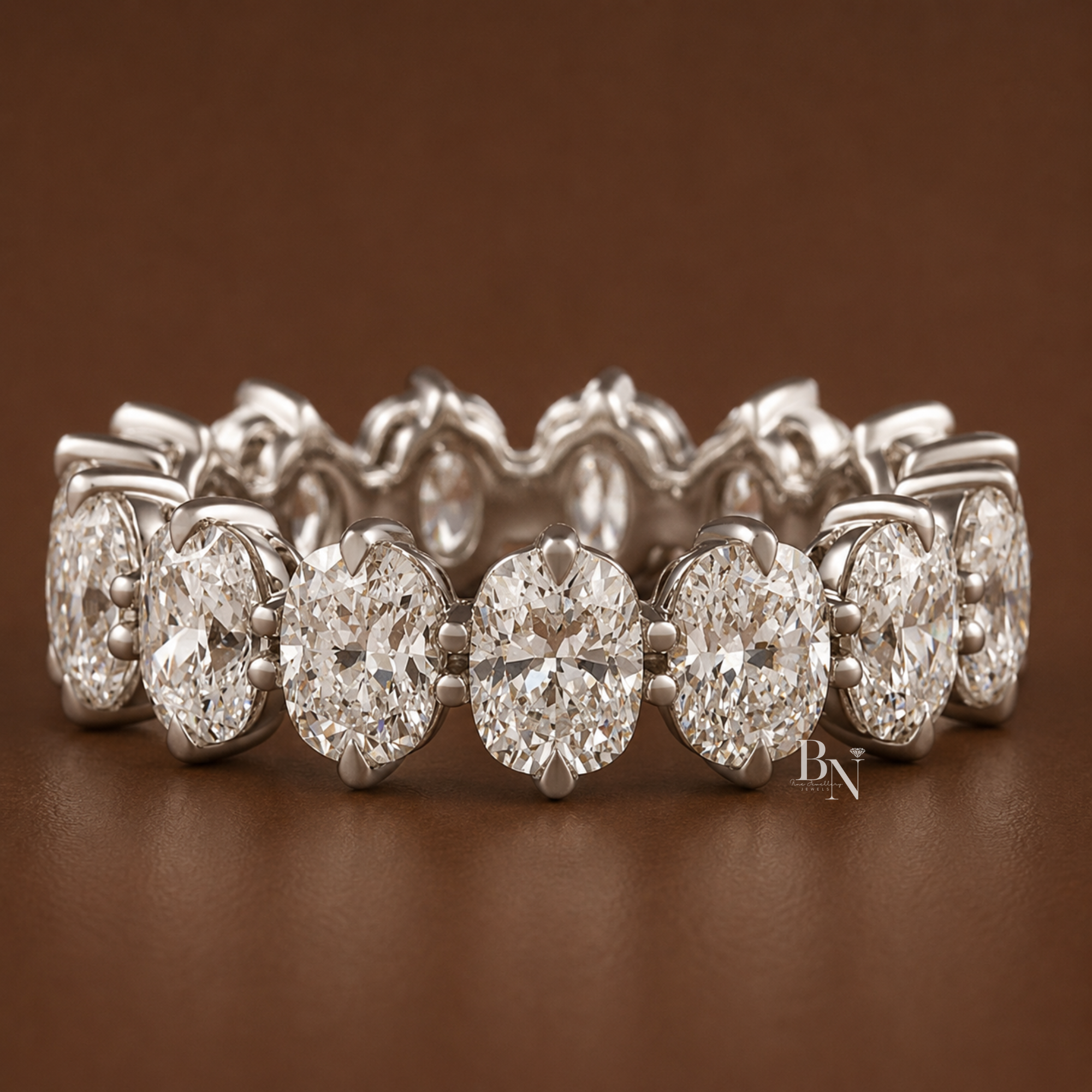 4.60 carat total weight elongated cushion cut lab diamond full eternity band in a 14k gold compass prong setting. Measuring 5.7mm wide, this luxurious made-to-order bridal stacking ring showcases brilliant craftsmanship and breathtaking elegance.