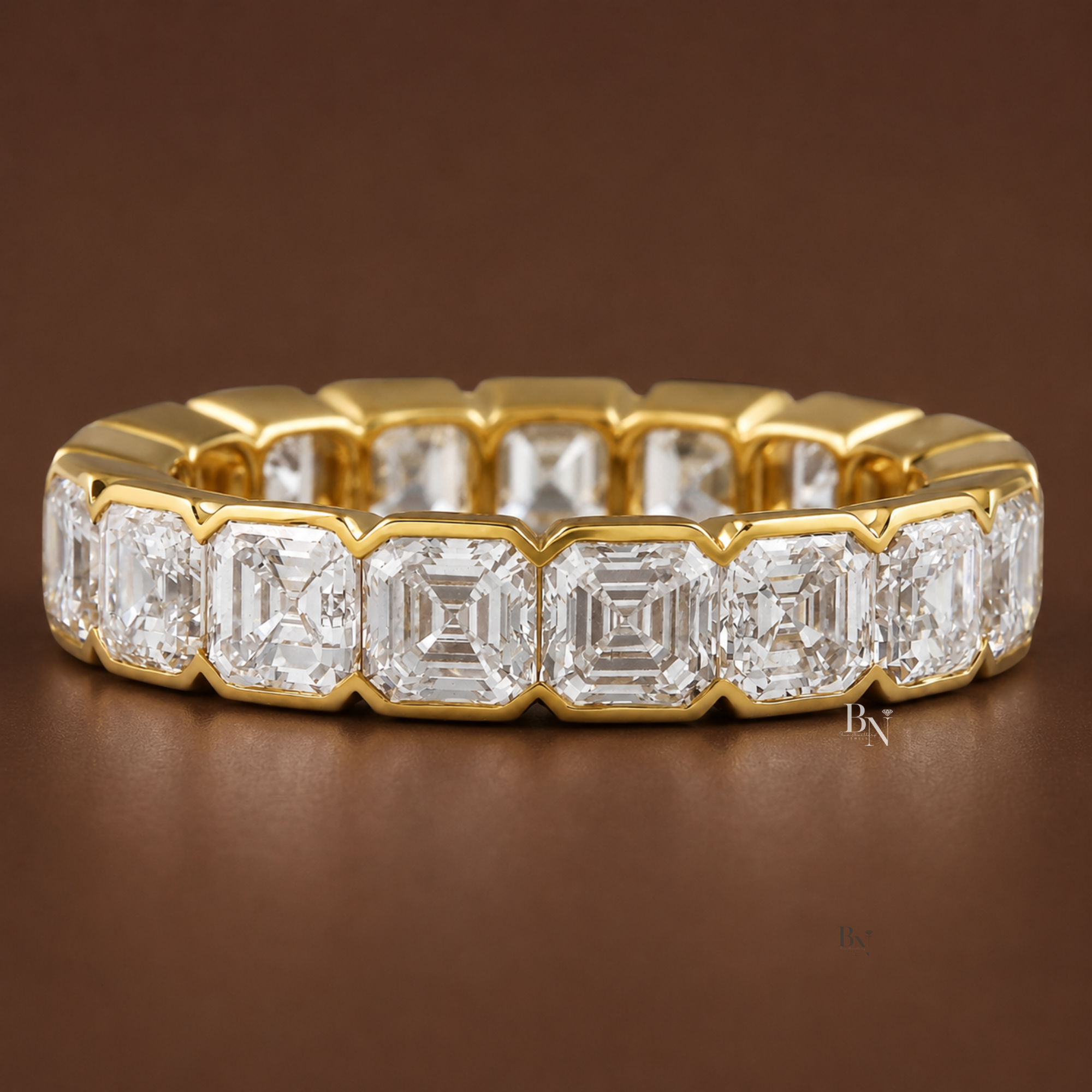 5.30 carat total weight Asscher cut lab diamond full eternity band in a 14k gold bezel setting. Showing a 4.6mm wide luxury wedding ring displaying brilliant square step-cut stones wrapped entirely in precious metal.