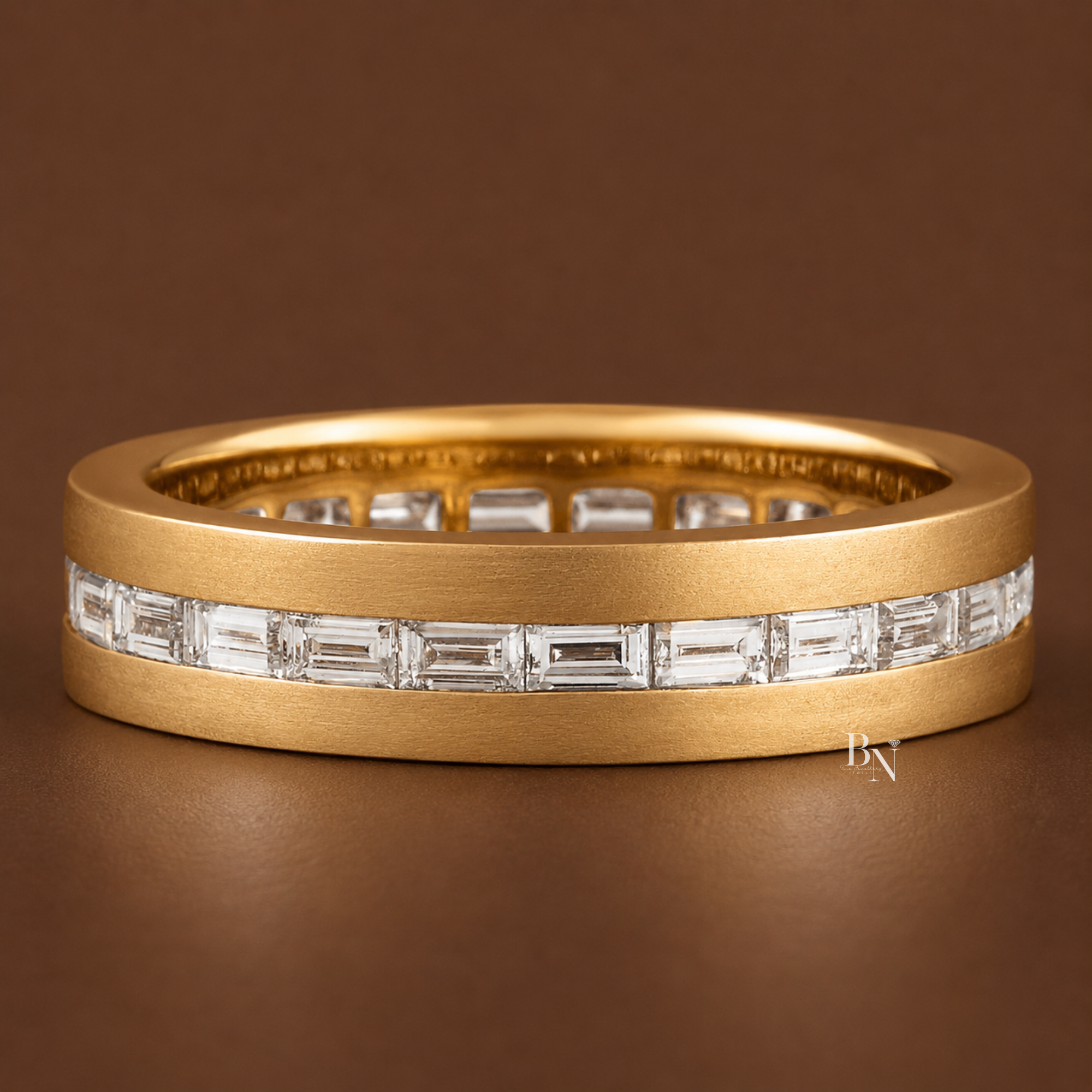 Yellow gold 5.5mm men's wedding band featuring east-west straight baguette lab-grown diamonds in a smooth channel setting with a matte exterior finish.