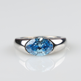 2.5ct Fancy Blue Oval Cut Lab Grown Diamond Ring, Bezel Set Modern Solitaire