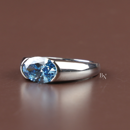 2.5ct Fancy Blue Oval Cut Lab Grown Diamond Ring, Bezel Set Modern Solitaire