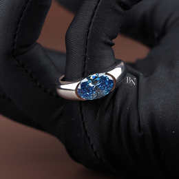 2.5ct Fancy Blue Oval Cut Lab Grown Diamond Ring, Bezel Set Modern Solitaire