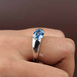 2.5ct Fancy Blue Oval Cut Lab Grown Diamond Ring, Bezel Set Modern Solitaire
