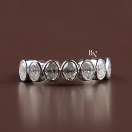 1.2 CTW Oval Lab Grown Diamond Bezel Wedding Band, 7 Stone Half Eternity Ring in Gold