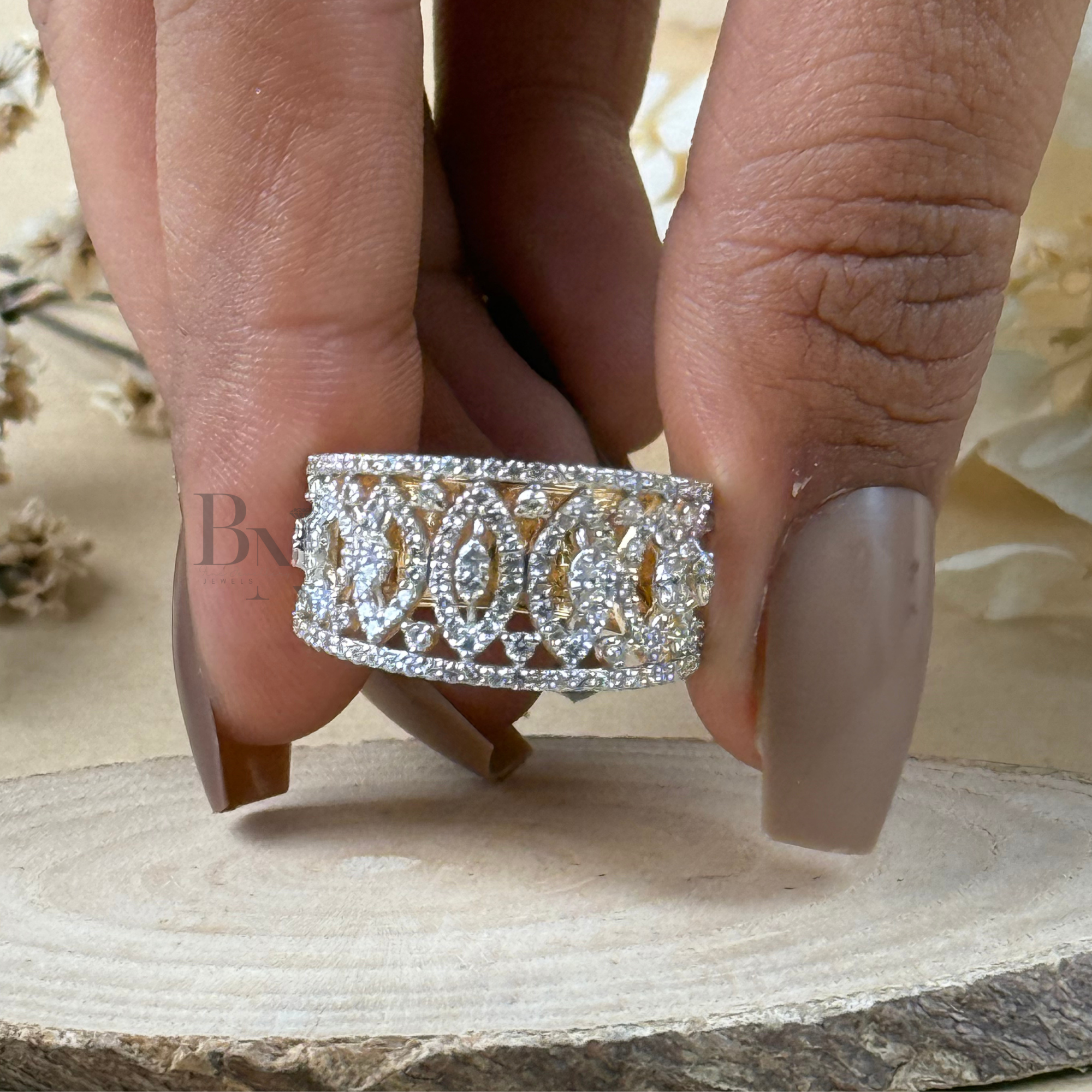 Wide 14k yellow gold wedding band featuring an intricate Art Deco filigree pattern of marquise and round lab grown diamonds in a pavé geometric lattice design.