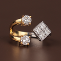 Dainty 14k two-tone gold bypass ring featuring a kite-set square princess cut lab diamond cluster and two round brilliant stones in a unique Toi et Moi engagement setting for a modern luxury bridal look.