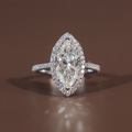 3 carat marquise cut lab grown diamond engagement ring in 14k white gold featuring a brilliant diamond halo and a slim pave encrusted band showing high-set cathedral profile and icy white Type IIa clarity.