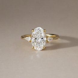2.5ct Oval Lab Grown Diamond Engagement Ring | Pear Side Stones 14K Yellow Gold